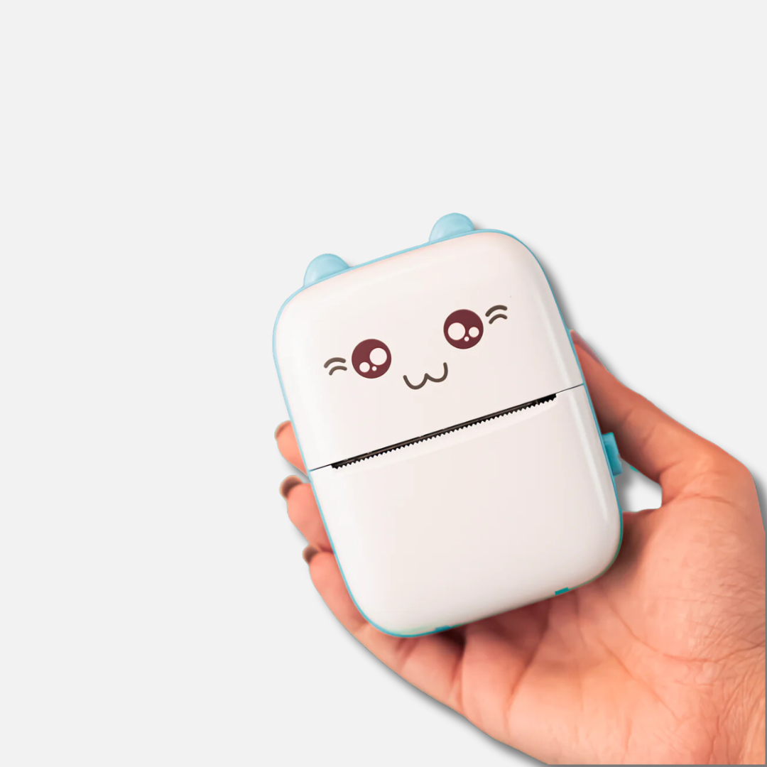 a hand holding a small white and blue case